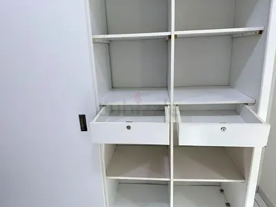 Urgent sale White wardrobe with shelves and drawers