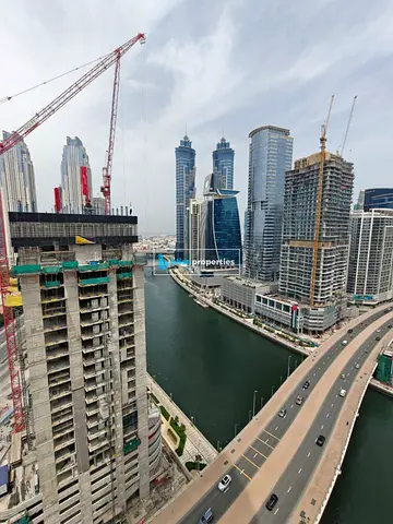 Furnished 1BR Apartment | Balcony | Ready to Move In | Canal & Skyline Views