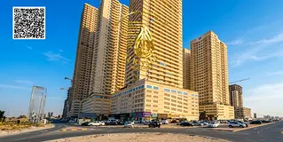 Two-bedroom apartment with a spacious living room in Emirates City, with parking and gym.