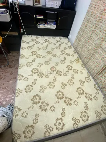 Bed with headboard