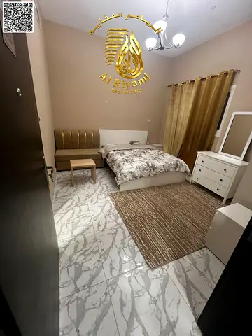 Studio apartment for monthly rent in Al Rashidiya 3, opposite Ajman One, with a separate kitchen.
