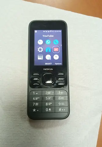 Nokia feature phone with basic apps (WhatsApp/YouTube) - good condition