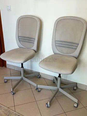 Pair of light grey mesh office chairs — good condition