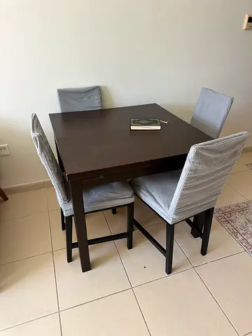 IKEA expandable dining table with 4 chairs — good condition