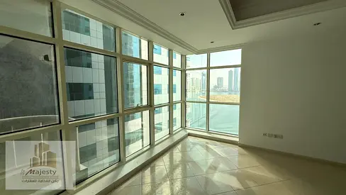 Apartment for sale in Al Anwar Tower on Khan Corniche, 3 rooms and a living room with an area of 2000 square feet, private parking, and spacious areas