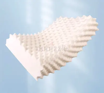 Thai natural latex pillow with rubber core, adjusts cervical spine and prevents mites.