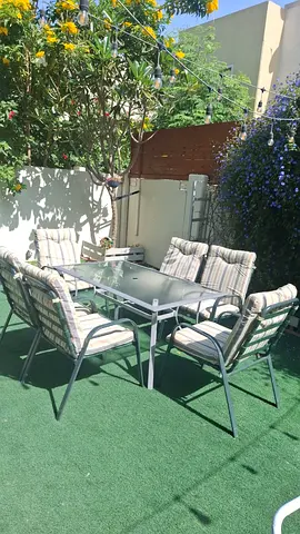 Garden glass table with 6 chairs and Cushions