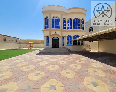 Villa for rent in Al Hamedia area, consisting of five master bedrooms, a majlis, a living room, and a maid's room