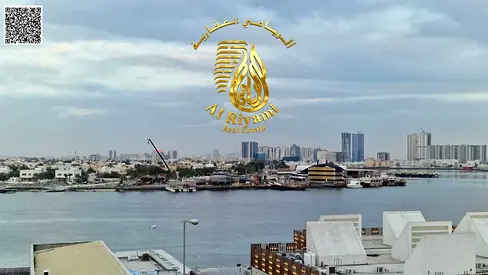 Two-bedroom apartment with a living room for annual rent, with an open view on Al Mina Street.