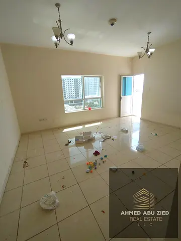 2BR apartment in Orient Towers, Ajman. 1442 sq.ft, 3 bathrooms, closed kitchen, open view. Building offers pool, gym, parking, mosque and kids area. F