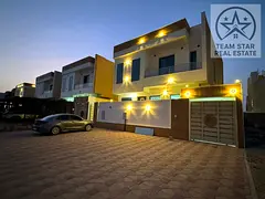 Villa for rent in Al Yasmin area, consisting of five master bedrooms, a majlis, a living room, and a