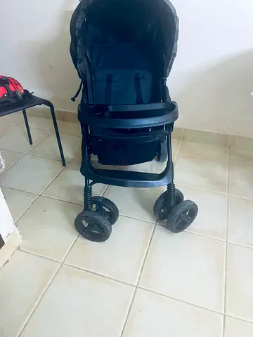 Used black standard baby stroller in good condition
