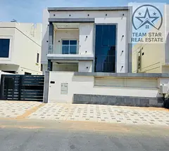 Villa for rent in Al Yasmin area, consisting of five master bedrooms, a majlis, a living room, and a