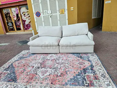Beige Home Center swin feather filled sofa