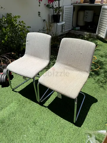 Set of 4 modern beige dining chairs with chrome legs