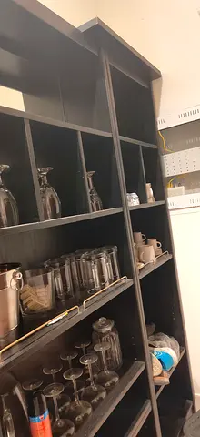 Tall Black Storage Shelving Unit — Used as Bar  Shoe Rack