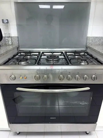 Bosch stainless steel 5-burner gas range with oven - good condition