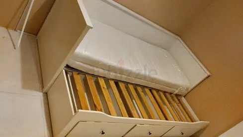 IKEA hamnes day bed with 3 big storage drawers underneath and with 2 IKEA mattresses is available