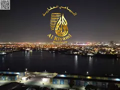Luxury apartment for rent with a large terrace and a view of Ajman Creek