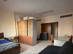 Room, with seperate toilet and kitchen.