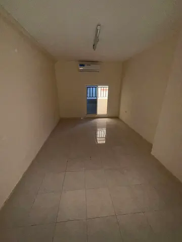 Studio apartment for annual rent in Ajman | Bathroom | Separate kitchen | Balcony | Suitable size | Prime location close to services | High-end finish