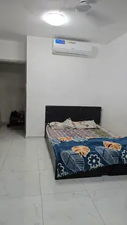 Family sharing room for Muslim couple or family