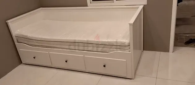 IKEA Hamnes Day bed with 3 storage drawers underneath and with 2 IKEA mattresses is available in exc