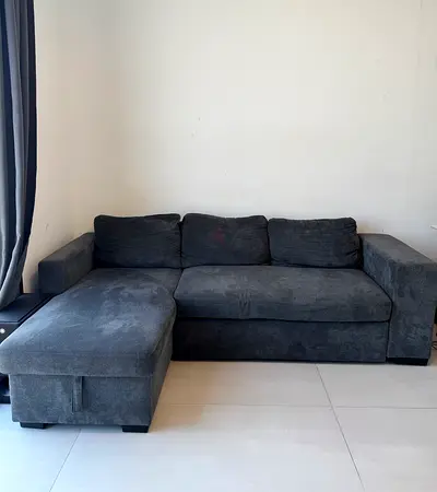 L-Shape Convertible Sofa Bed with Storage – Grey (Home Box)
