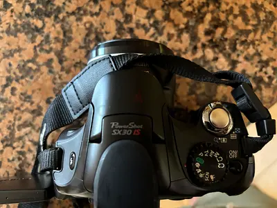 Cannon power shot sx30 is digital camera with bag