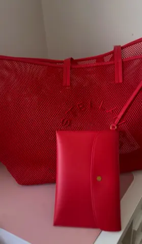 Red Stella McCartney X HnM collection mesh tote. Used for photos and pictures only.