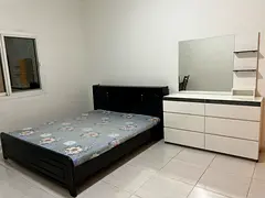 Peaceful Furnished  Spacious Room Available a minute away from Sharaf DG Metro