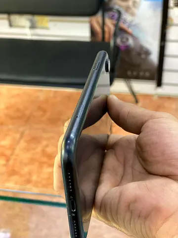 iPhone xR used, good condition with charger port visible