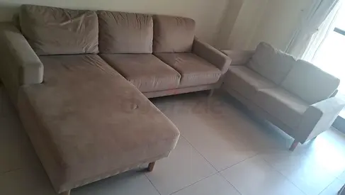 L-shaped beige fabric sofa set with chaise and single-seater, excellent condition