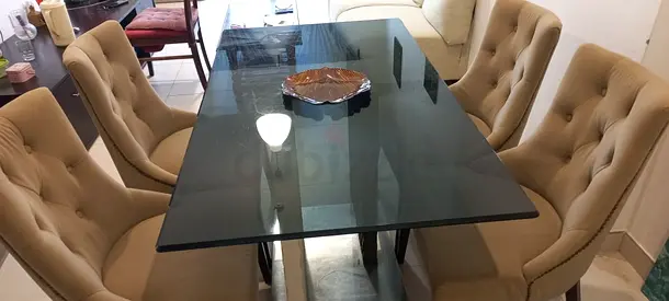 Glass Top Dining Table with 4 Beige Upholstered Chairs