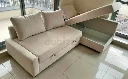 IKEA L shap Sofa store cum bed you can fix the storage lift or Right