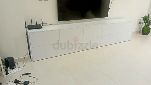 Contemporary MDF TV Console Unit with Wood Slat Accent Wall and Hidden Storage