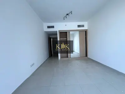 Pool View Studio | Balcony | Modern Kitchen | Oxford Building JVC