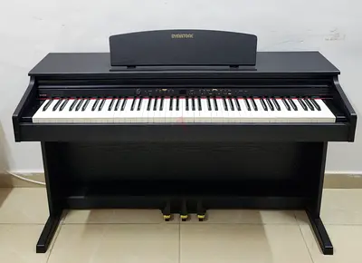 The Dynatone SLP-150 is a compact, 88-key digital piano featuring Natural Hammer Action (NHA) for a