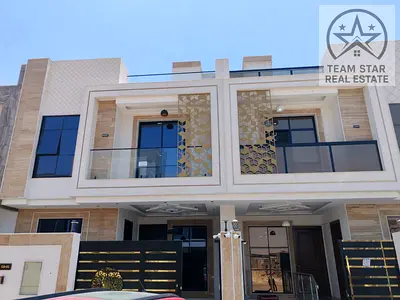 Villa for rent in Al Yasmin area, consisting of five master bedrooms, a majlis, a living room, and a maid's room