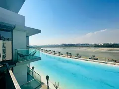 Fully Furnished 1BR Lagoon View District One 100K