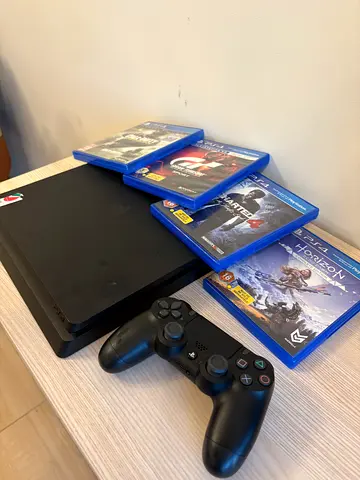 Sony PS4 with Controller and 4 Games