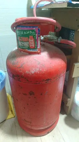 Used LPG Gas Cylinder (Red) -  Ajman -UAE 20kg approx, functional