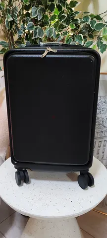 Small hard-shell black carry-on spinner suitcase - good condition