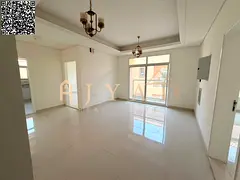 3BR hall for annual rent in Al Mowaihat 3, Ajman. Free month, central AC, wardrobes, balcony, easy p