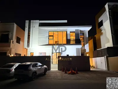 Villa with all registration and ownership fees included, on the main street, ready to move in, in one of the most prestigious areas of Ajman, freehold
