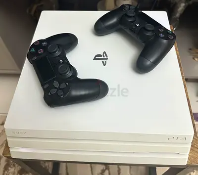 White PS4 Pro (Sony PlayStation 4) with 2 DualShock 4 Controllers - Good Condition