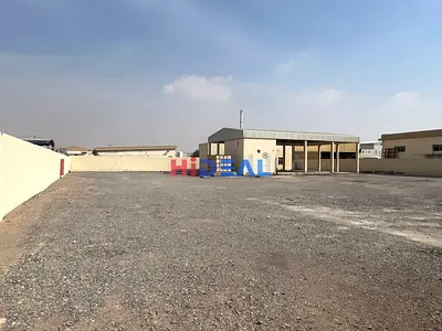 30000 SQFT YARD WITH 70 KW, LABOUR ROOM,SHED AVAILABLE FOR RENT IN UAQ !!