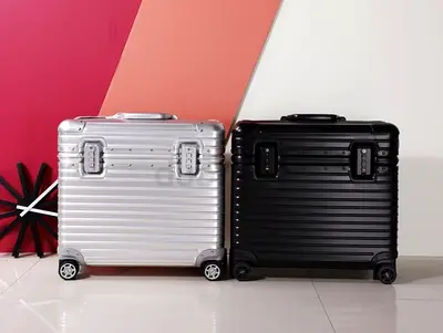 Rimowa  Carry-on Suitcases – Silver  Black