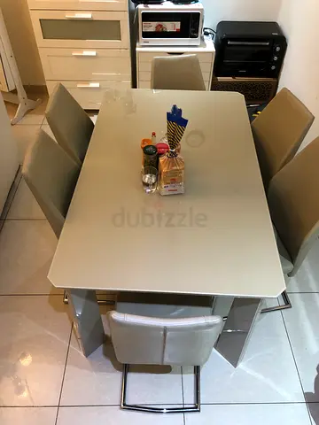 Modern white dining table with 6 chairs - good condition