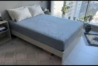 Queen bed frame with mattress and side tables - good condition
